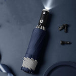 Weatherproof LED umbrella with reflective details and inverted design