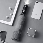 Weatherproof LED umbrella with reflective details and inverted design