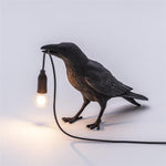 Kunstvolle Tischlampe in Krähenform mit Leuchtmittel