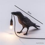 Kunstvolle Tischlampe in Krähenform mit Leuchtmittel