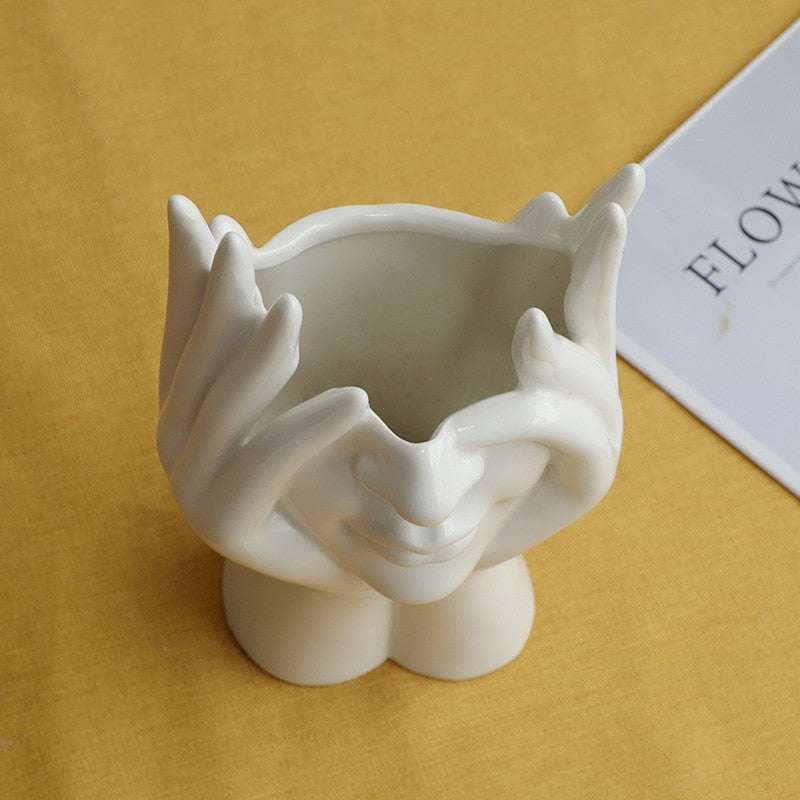 Keramische Blumenvase mit abstraktem menschlichen Gesicht