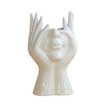 Keramische Blumenvase mit abstraktem menschlichen Gesicht