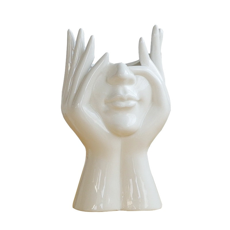 Keramische Blumenvase mit abstraktem menschlichen Gesicht