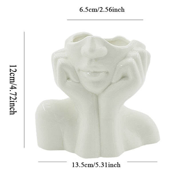 Keramische Blumenvase mit abstraktem menschlichen Gesicht