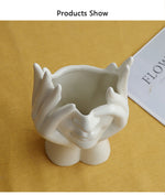 Keramische Blumenvase mit abstraktem menschlichen Gesicht