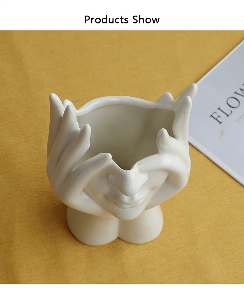 Keramische Blumenvase mit abstraktem menschlichen Gesicht