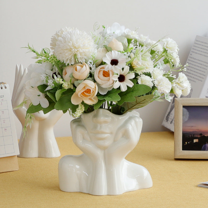 Keramische Blumenvase mit abstraktem menschlichen Gesicht