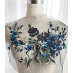 Eleganter Blumenstick-Patch mit Perlenverzierung