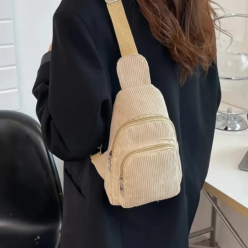 Stylish corduroy shoulder bag with practical compartments