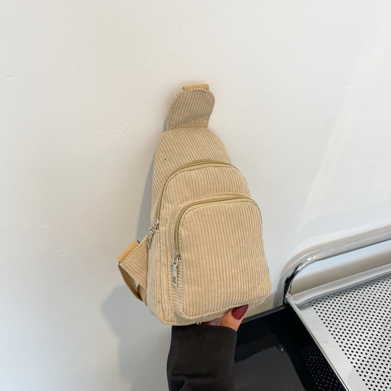 Stylish corduroy shoulder bag with practical compartments