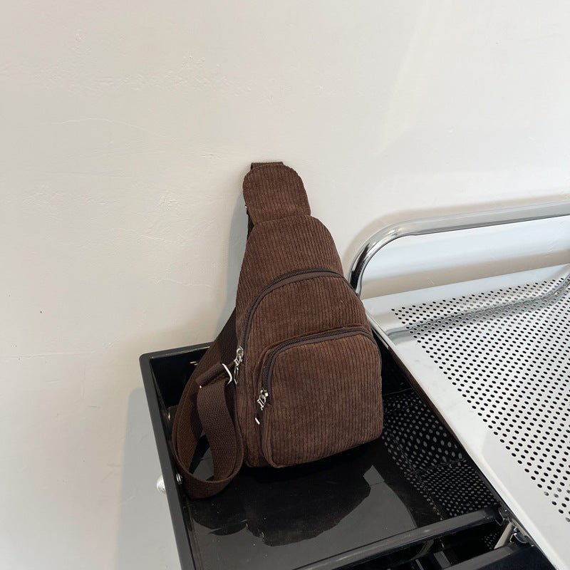 Stylish corduroy shoulder bag with practical compartments