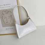 Elegant baguette bag in a stylish snake look