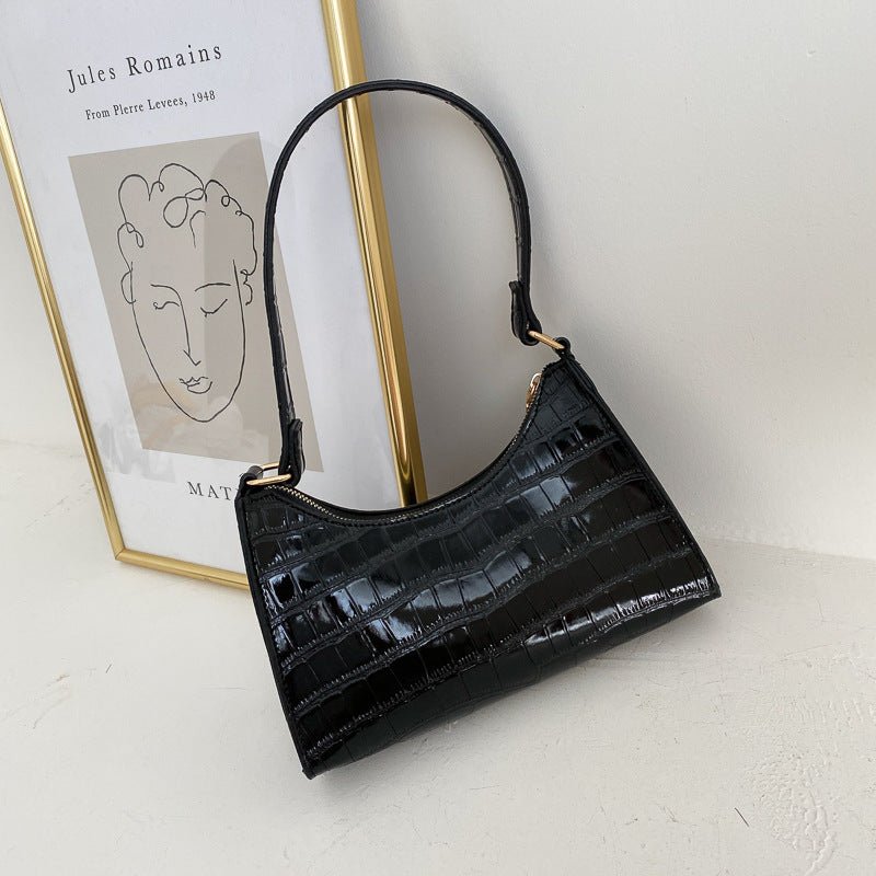 Elegant baguette bag in a stylish snake look