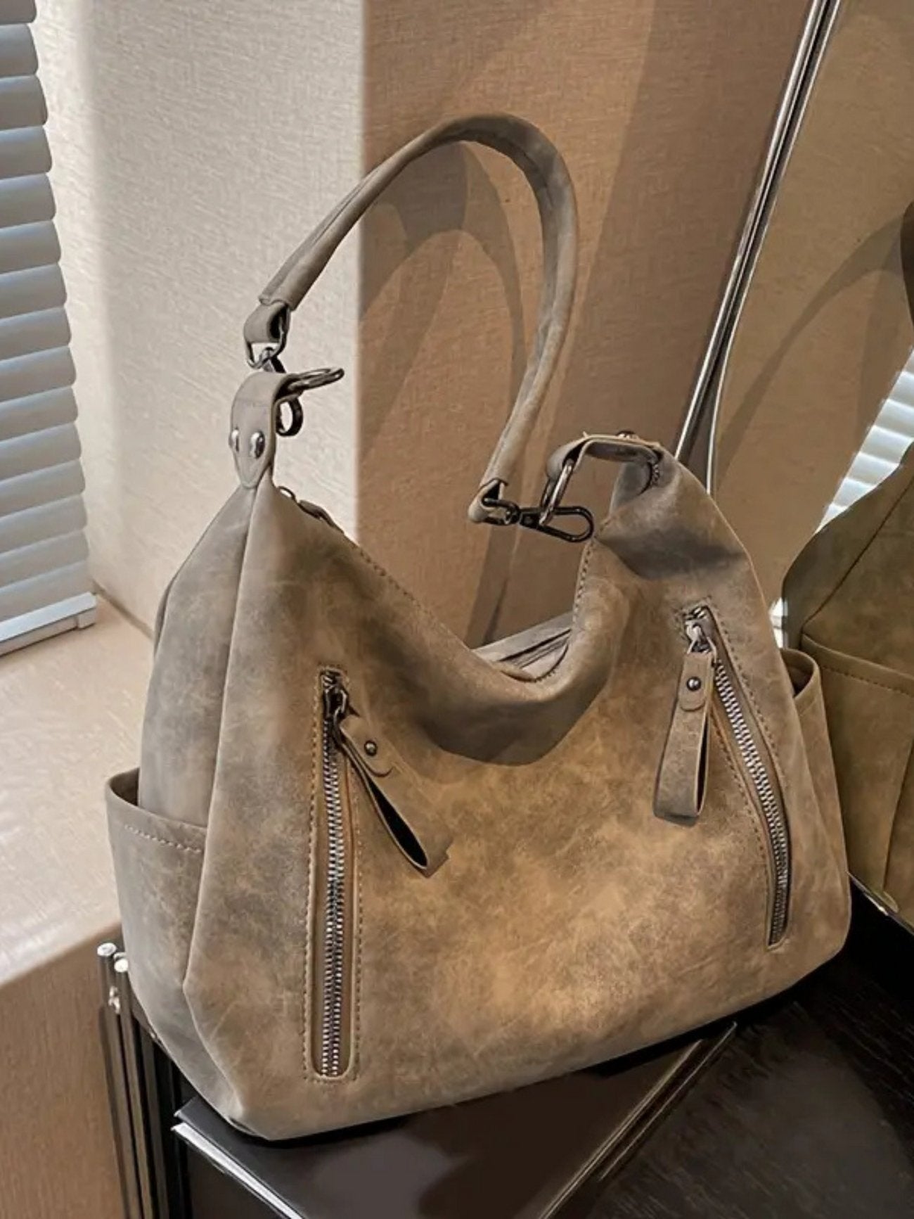 Elegant shoulder bag made of high-quality suede for modern women
