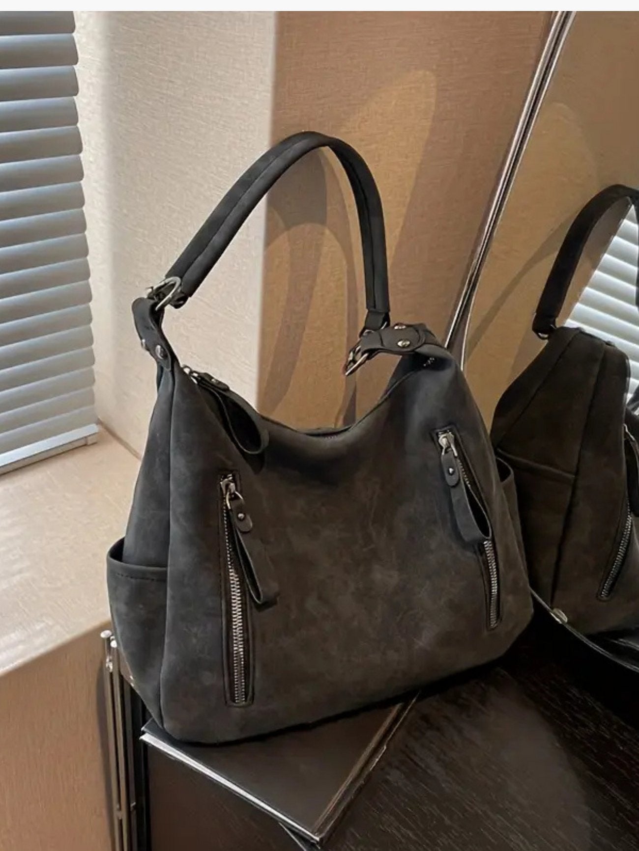 Elegant shoulder bag made of high-quality suede for modern women