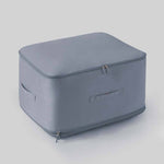Space-saving, self-compressing storage bag