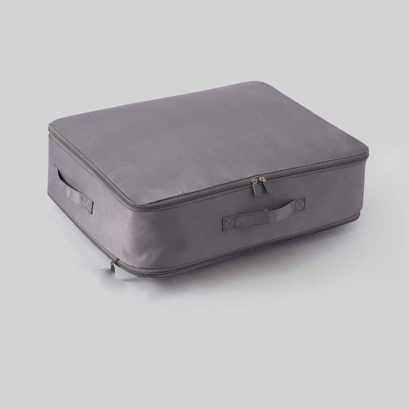 Space-saving, self-compressing storage bag