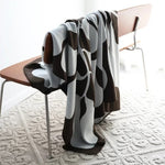 Colorful throw blanket in a modern block design