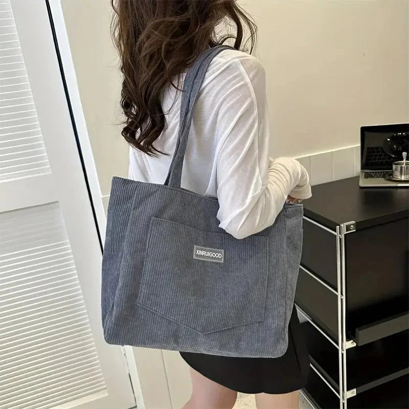Elegant women's tote in classic colors with generous storage space
