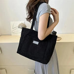 Elegant women's tote in classic colors with generous storage space