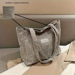 Elegant women's tote in classic colors with generous storage space