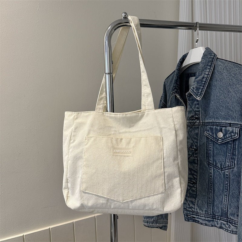 Elegant women's tote in classic colors with generous storage space