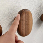 Elegant wall hooks made of fine wood for stylish storage