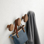 Elegant wall hooks made of fine wood for stylish storage