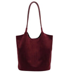Luxurious suede bag with plenty of storage for any occasion