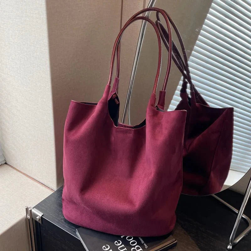 Luxurious suede bag with plenty of storage for any occasion