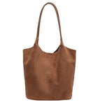 Luxurious suede bag with plenty of storage for any occasion