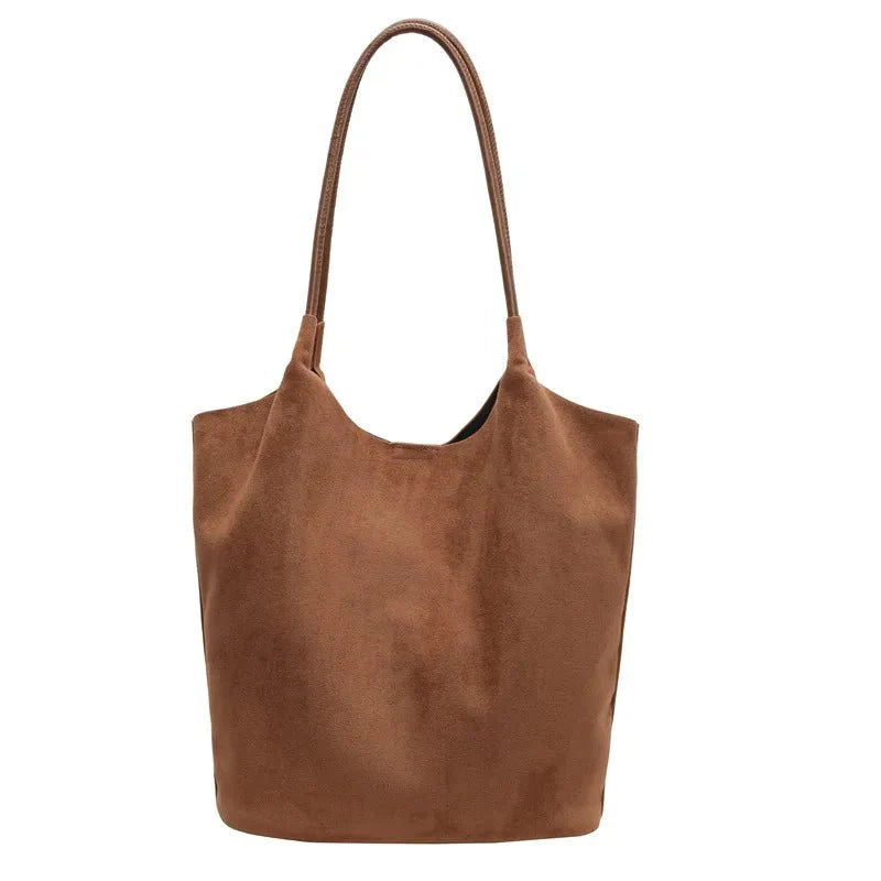Luxurious suede bag with plenty of storage for any occasion