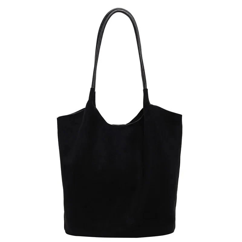 Luxurious suede bag with plenty of storage for any occasion