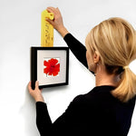 Simple picture hanging system with integrated spirit level