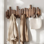 Elegant wooden coat rack with flexible magnetic hangers