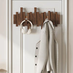 Elegant wooden coat rack with flexible magnetic hangers